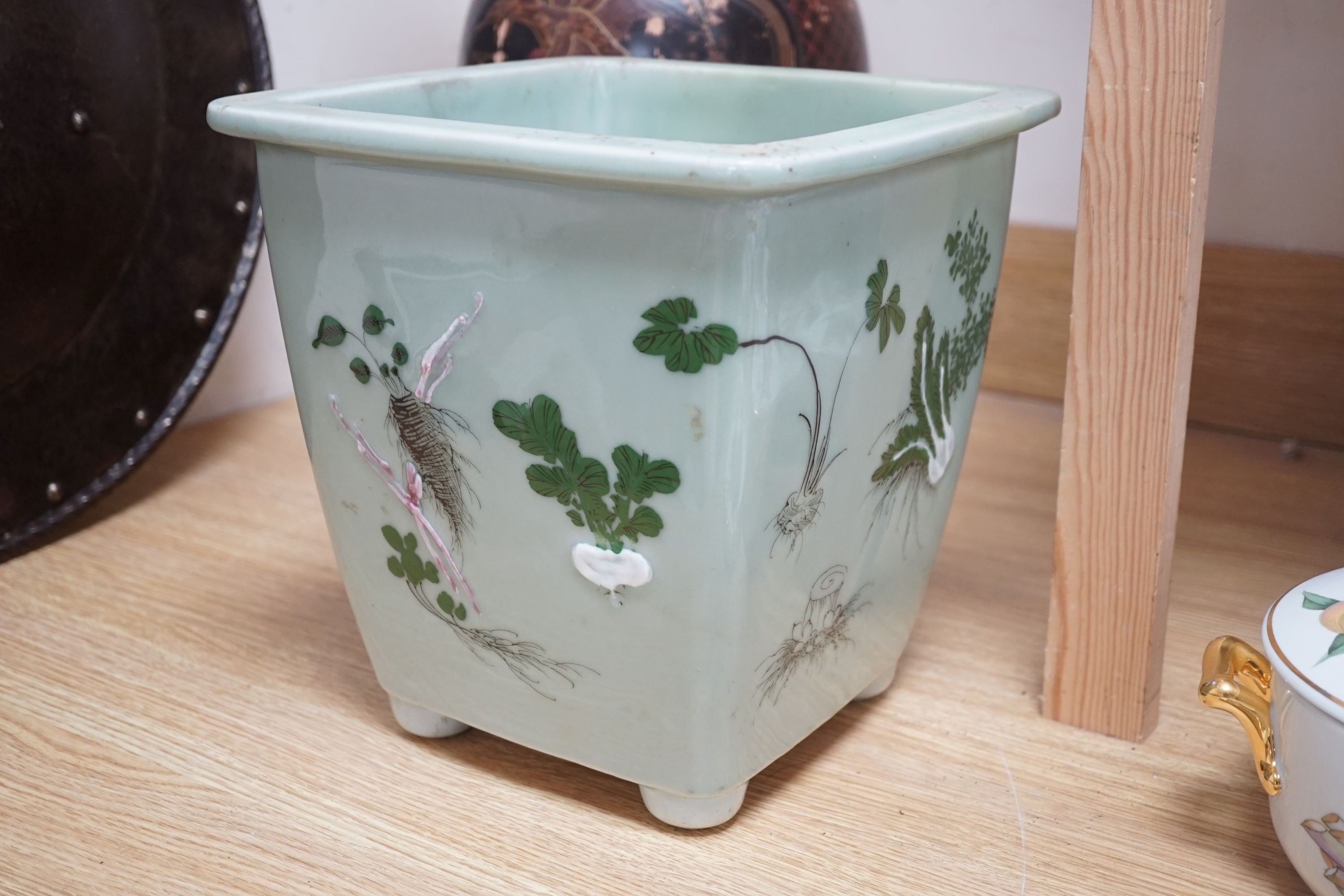 A large Japanese lacquered porcelain vase and a Japanese celadon ground jardiniere-vase 50 cms high.